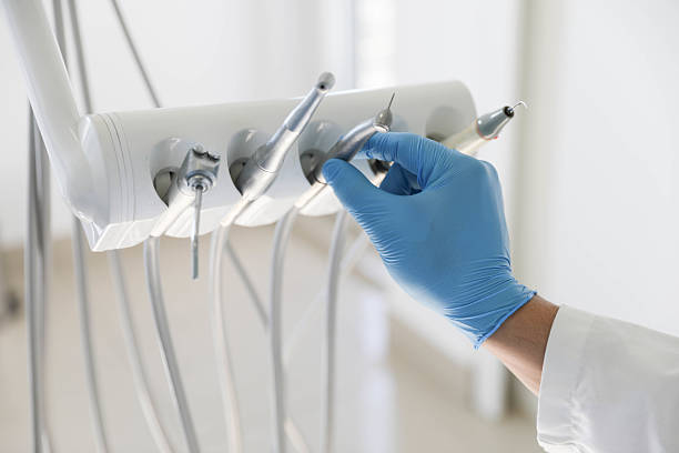 Professional Tooth Extraction technician working in Valmeyer, IL